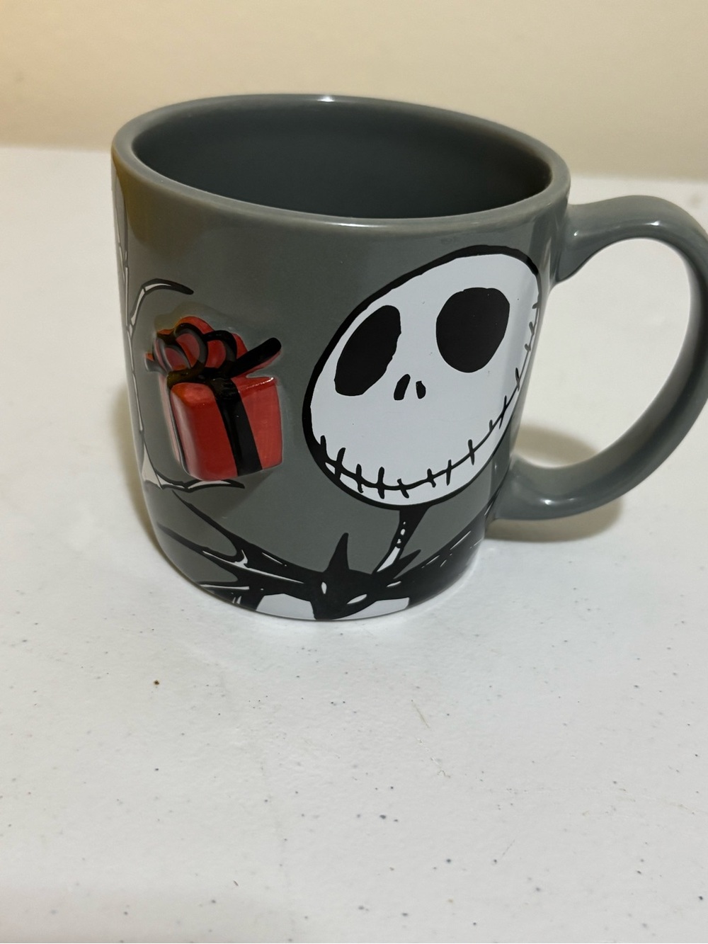 Disney Grey Jack Skellington Ceramic Mug with Red Present Accent